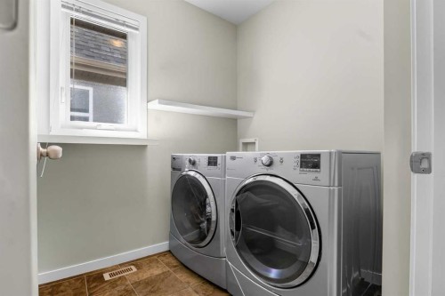 213 Mahogany Heights Se, Calgary, AB - Indoor Photo Showing Laundry Room