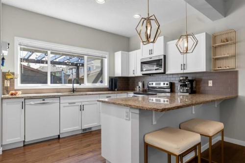 213 Mahogany Heights Se, Calgary, AB - Indoor Photo Showing Kitchen With Upgraded Kitchen