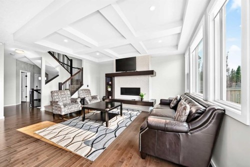 296 Nolancrest Heights Nw, Calgary, AB - Indoor Photo Showing Living Room With Fireplace