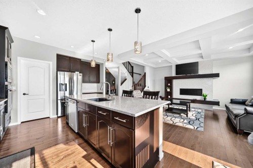 296 Nolancrest Heights Nw, Calgary, AB - Indoor Photo Showing Kitchen With Fireplace With Upgraded Kitchen