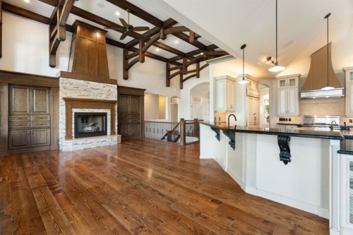 8 Blueridge Drive, Rural Rocky View County, AB - Indoor Photo Showing Kitchen With Fireplace With Upgraded Kitchen