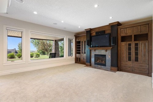 8 Blueridge Drive, Rural Rocky View County, AB - Indoor Photo Showing Living Room With Fireplace