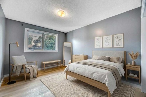 4819 Memorial Drive Se, Calgary, AB - Indoor Photo Showing Bedroom