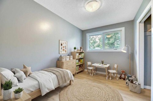 4819 Memorial Drive Se, Calgary, AB - Indoor Photo Showing Bedroom