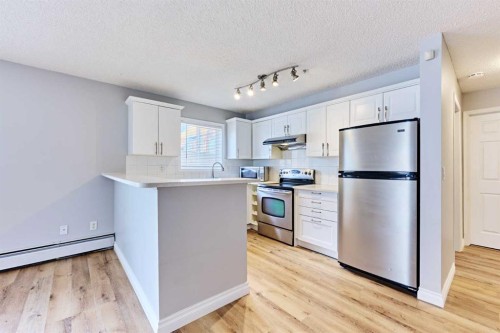 106-126 14 Avenue Sw, Calgary, AB - Indoor Photo Showing Kitchen With Stainless Steel Kitchen