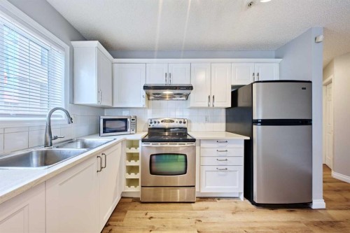 106-126 14 Avenue Sw, Calgary, AB - Indoor Photo Showing Kitchen With Stainless Steel Kitchen With Double Sink