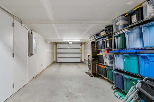 103 Spring Creek Common Sw, Calgary, AB - Indoor Photo Showing Garage