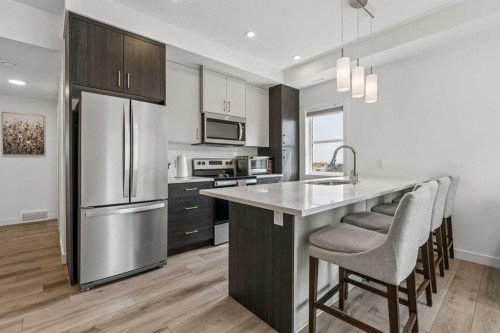103 Spring Creek Common Sw, Calgary, AB - Indoor Photo Showing Kitchen With Upgraded Kitchen