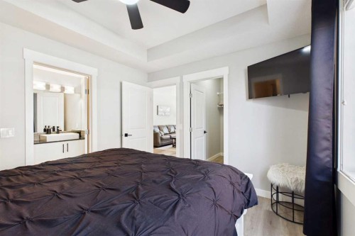 1-67 West Coach Manor Sw, Calgary, AB - Indoor Photo Showing Bedroom