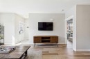 1-67 West Coach Manor Sw, Calgary, AB  - Indoor Photo Showing Living Room 