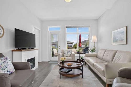 318 Marina Cove Se, Calgary, AB - Indoor Photo Showing Living Room