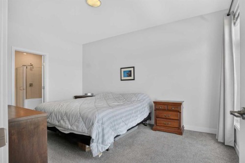 318 Marina Cove Se, Calgary, AB - Indoor Photo Showing Bedroom