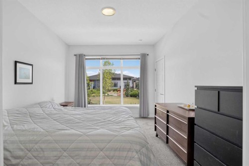 318 Marina Cove Se, Calgary, AB - Indoor Photo Showing Bedroom