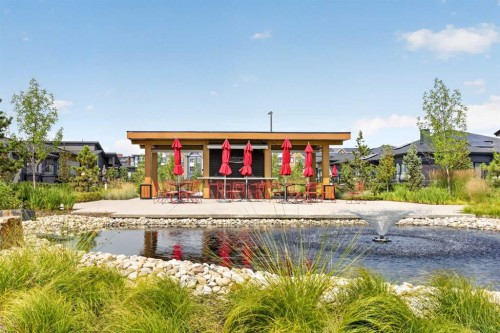 318 Marina Cove Se, Calgary, AB - Outdoor With Body Of Water