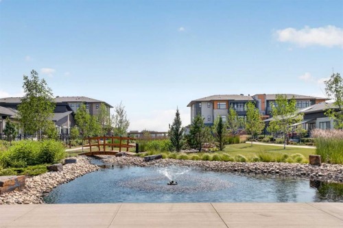 318 Marina Cove Se, Calgary, AB - Outdoor With Body Of Water