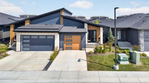 318 Marina Cove Se, Calgary, AB - Outdoor With Facade