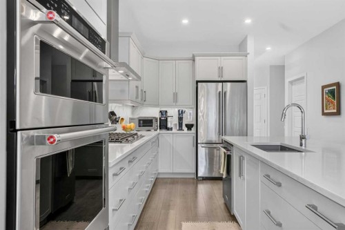 318 Marina Cove Se, Calgary, AB - Indoor Photo Showing Kitchen With Upgraded Kitchen