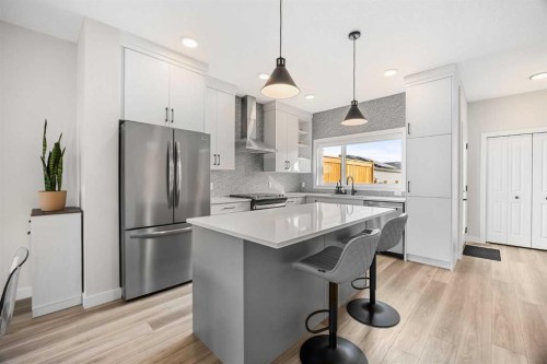 211 Silverton Glen Crescent Sw, Calgary, AB - Indoor Photo Showing Kitchen With Upgraded Kitchen