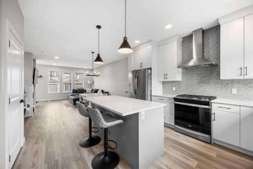211 Silverton Glen Crescent Sw, Calgary, AB - Indoor Photo Showing Kitchen With Upgraded Kitchen