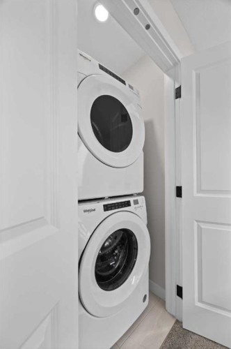 211 Silverton Glen Crescent Sw, Calgary, AB - Indoor Photo Showing Laundry Room