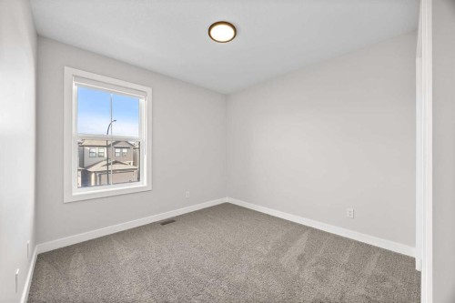 211 Silverton Glen Crescent Sw, Calgary, AB - Indoor Photo Showing Other Room