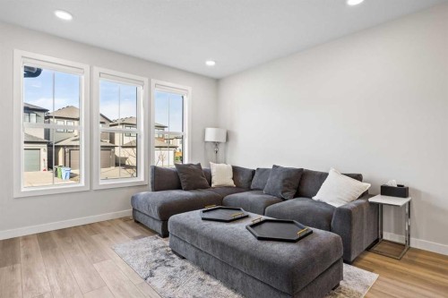 211 Silverton Glen Crescent Sw, Calgary, AB - Indoor Photo Showing Living Room