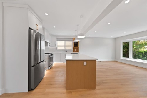 439 Arlington Drive Se, Calgary, AB - Indoor Photo Showing Kitchen With Stainless Steel Kitchen