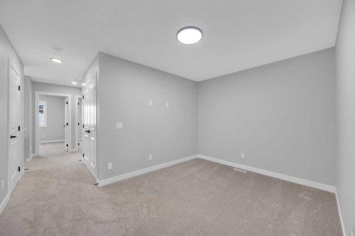 10 Versant Path Sw, Calgary, AB - Indoor Photo Showing Other Room