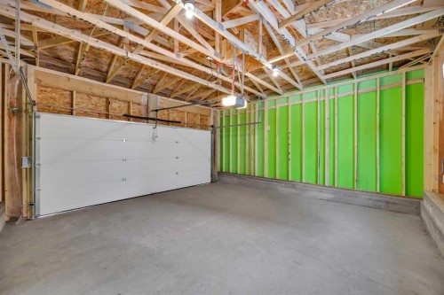 10 Versant Path Sw, Calgary, AB - Indoor Photo Showing Garage