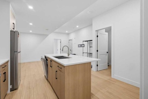 136 10 Avenue Nw, Calgary, AB - Indoor Photo Showing Kitchen With Double Sink