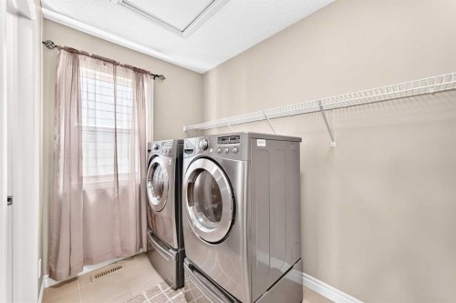 456 Mahogany Boulevard Se, Calgary, AB - Indoor Photo Showing Laundry Room
