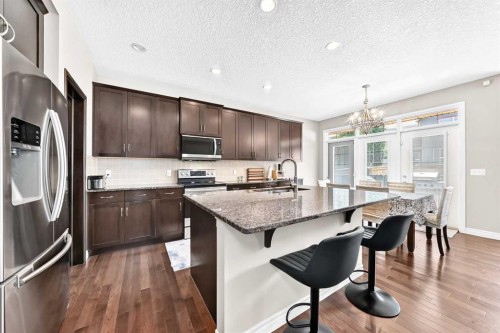 456 Mahogany Boulevard Se, Calgary, AB - Indoor Photo Showing Kitchen With Upgraded Kitchen