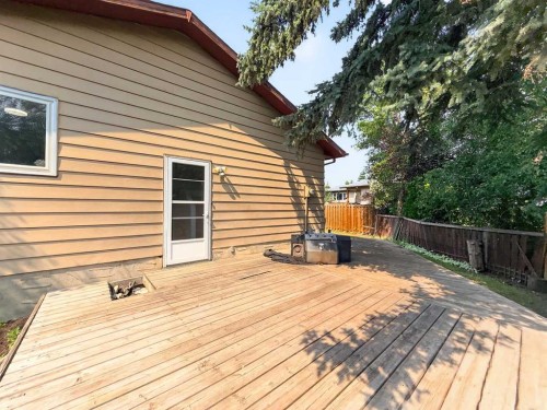 207 Deer Ridge Way Se, Calgary, AB - Outdoor With Deck Patio Veranda With Exterior