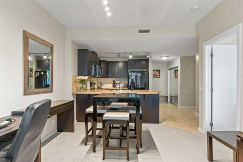 502-1410 1 Street Se, Calgary, AB - Indoor Photo Showing Dining Room