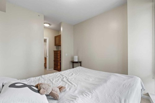 502-1410 1 Street Se, Calgary, AB - Indoor Photo Showing Bedroom