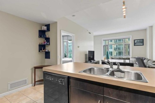 502-1410 1 Street Se, Calgary, AB - Indoor Photo Showing Kitchen With Double Sink