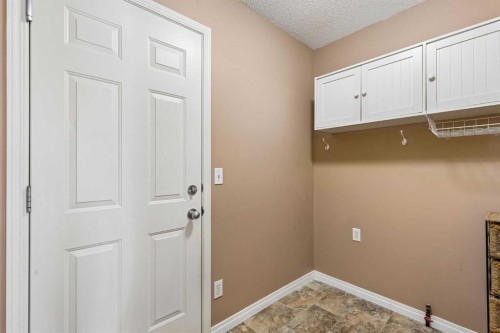 10-117 Bow Ridge Drive, Cochrane, AB - Indoor Photo Showing Other Room