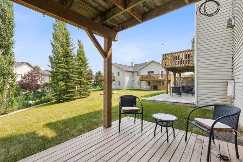 10-117 Bow Ridge Drive, Cochrane, AB - Outdoor With Deck Patio Veranda With Exterior