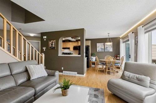 10-117 Bow Ridge Drive, Cochrane, AB - Indoor Photo Showing Living Room