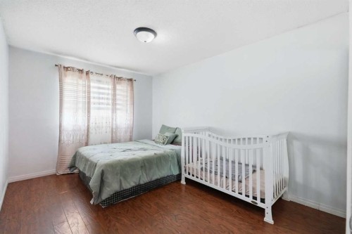 40 Penworth Place Se, Calgary, AB - Indoor Photo Showing Bedroom