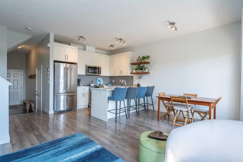 1207 Jumping Pound Common, Cochrane, AB - Indoor Photo Showing Kitchen