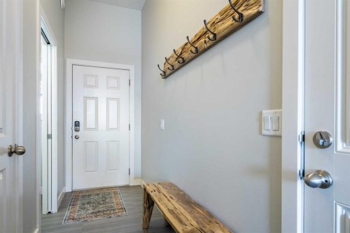 1207 Jumping Pound Common, Cochrane, AB - Indoor Photo Showing Other Room