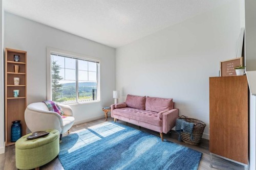1207 Jumping Pound Common, Cochrane, AB - Indoor Photo Showing Other Room