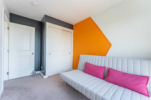 1207 Jumping Pound Common, Cochrane, AB - Indoor Photo Showing Bedroom
