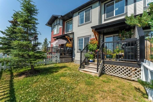1207 Jumping Pound Common, Cochrane, AB - Outdoor With Deck Patio Veranda