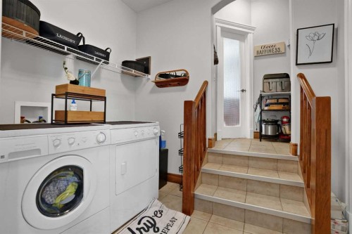 45 Sherwood View Nw, Calgary, AB - Indoor Photo Showing Laundry Room