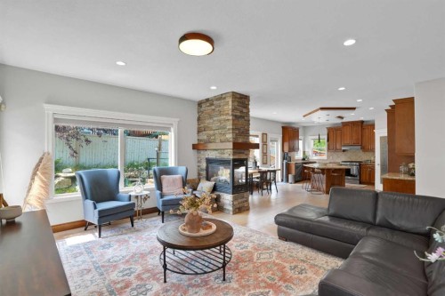 45 Sherwood View Nw, Calgary, AB - Indoor Photo Showing Living Room With Fireplace