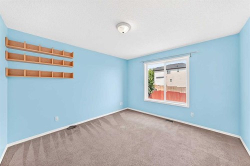 76 Coville Close Ne, Calgary, AB - Indoor Photo Showing Other Room