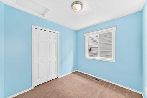 76 Coville Close Ne, Calgary, AB - Indoor Photo Showing Other Room