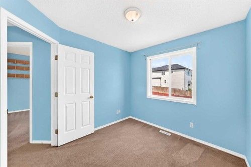 76 Coville Close Ne, Calgary, AB - Indoor Photo Showing Other Room